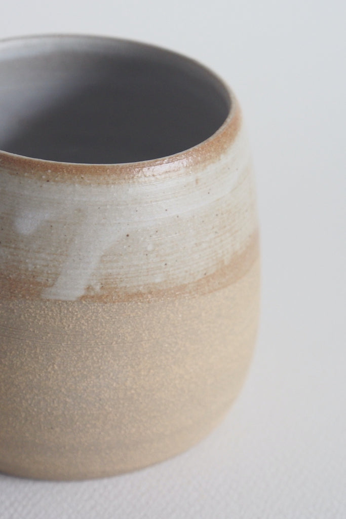 zoomed in shot showing how the glaze sits on the ceramic with the different colour tones and subtle patterns